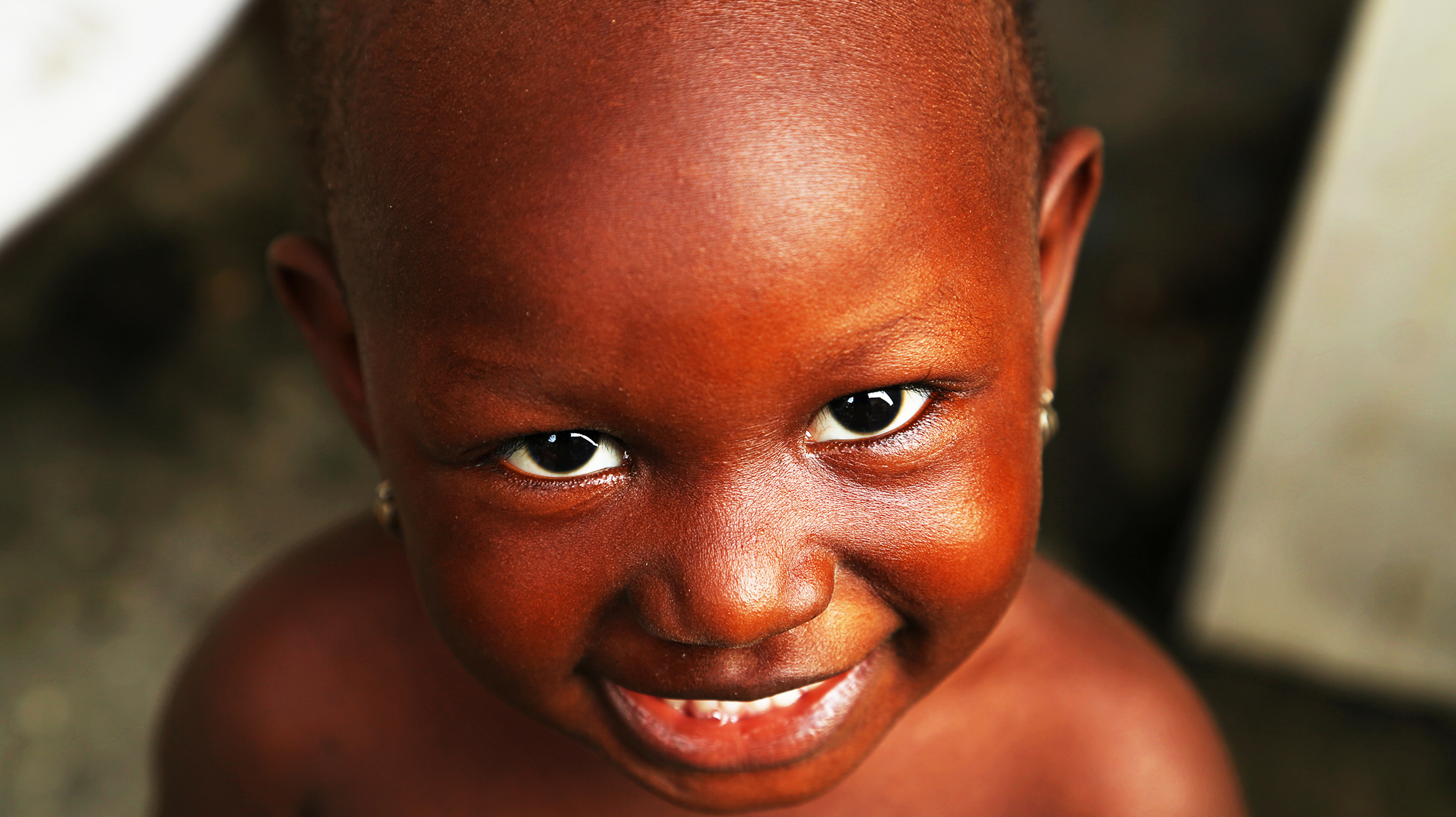 African child smiling - Bak2Buks Media